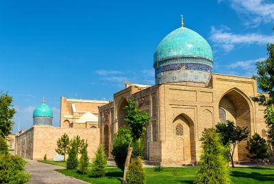 Blue domes featuring vibrant glazed tiles at the Hazrati Imam Complex, Tashkent