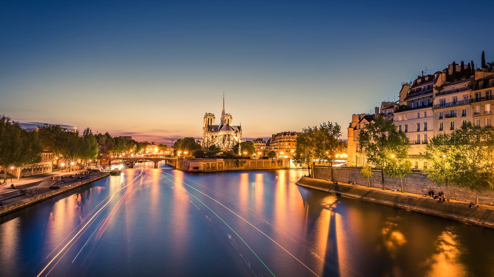 Parisian Sunset: Notre-Dame Cathedral and Seine River