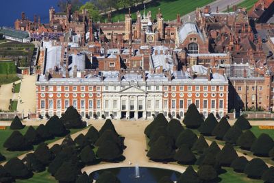 Sprawling Hampton Court Palace near Twickenham in London, with its landscaped gardens