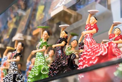 Painted flamenco dancer figurines on sale in a souvenir outlet in Spain