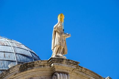 A statue of St. Blaise, the patron saint of Dubrovnik, with a gilded mitre