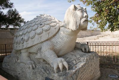 An imposing statue of the dragon-like Tarasque monster in Tarascon, Provence