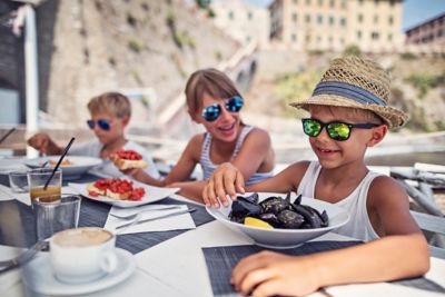 Kids eating seafood, popular in French cuisine