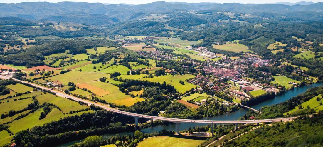 French Countryside Charm: Aerial View of Poncin Village and Ain River