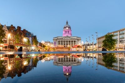 Old Market Square in Nottingham with the Council House reflected in a water feature