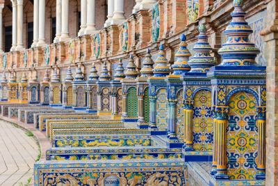 Ornate, brightly coloured ceramic tiles at the Plaza de España in Seville, Spain