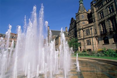 Elegant Victorian-era Sheffield Town Hall and Peace Gardens courtyard with water fountains