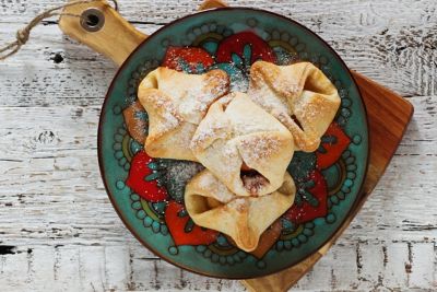 Sugar-dusted pastries on a rustic plate in Estonia