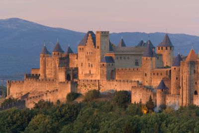 Carcassonne's medieval hilltop citadel, with its fairytale turrets, at sunset