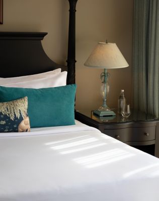 manor equitorial suite with king bed in kenya sunlit interiors