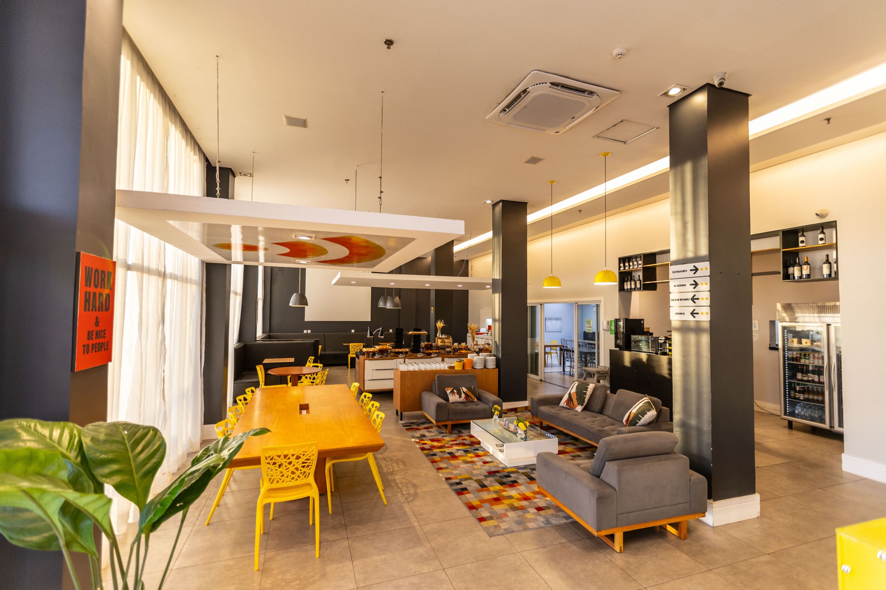 Modern Hotel Lobby with Buffet and Lounge Area