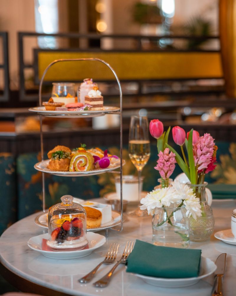 Afternoon tea with pastries, tea sandwiches and spring flowers at the Fairmont Olympic Hotel in Seattle