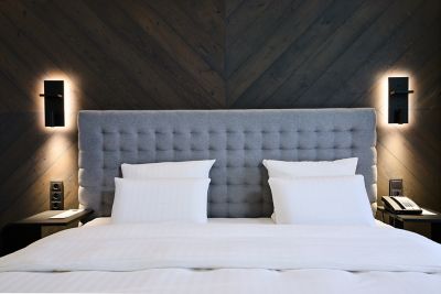 A hotel room at Pullman Riga Old Town, with neutral shades and subtle textures 