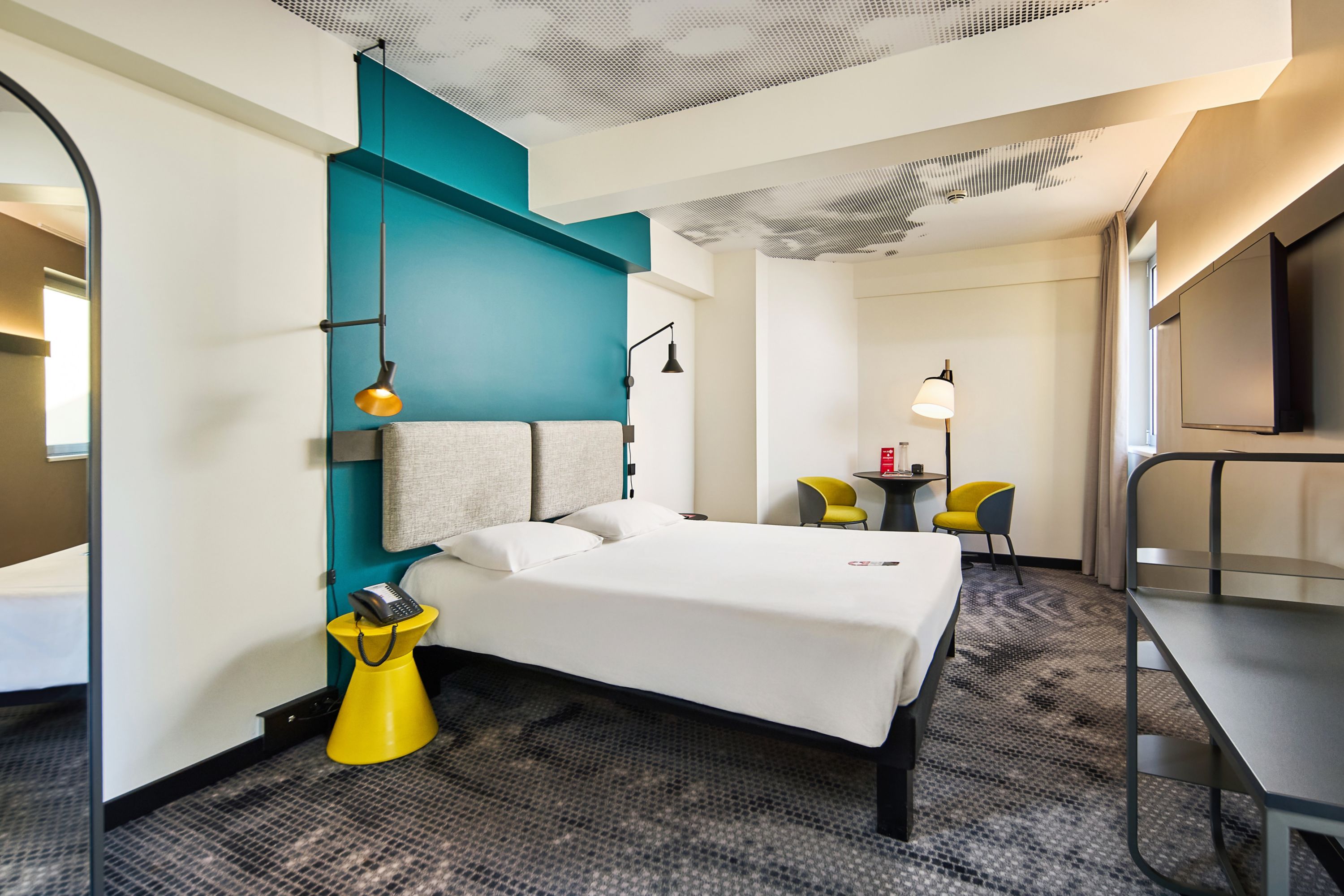 Modern Hotel Room with Vibrant Decor