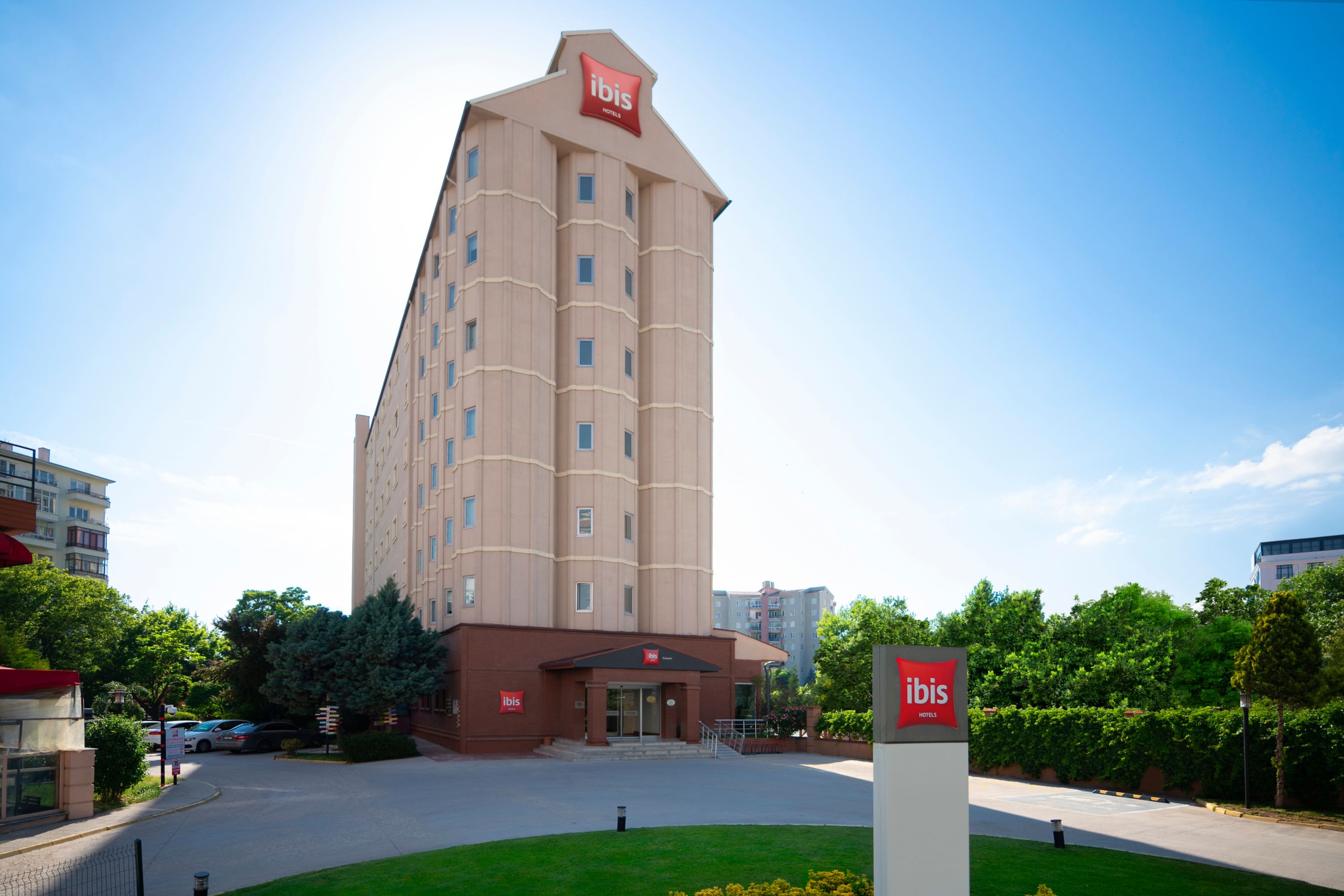 Modern ibis Hotel Exterior on a Sunny Day