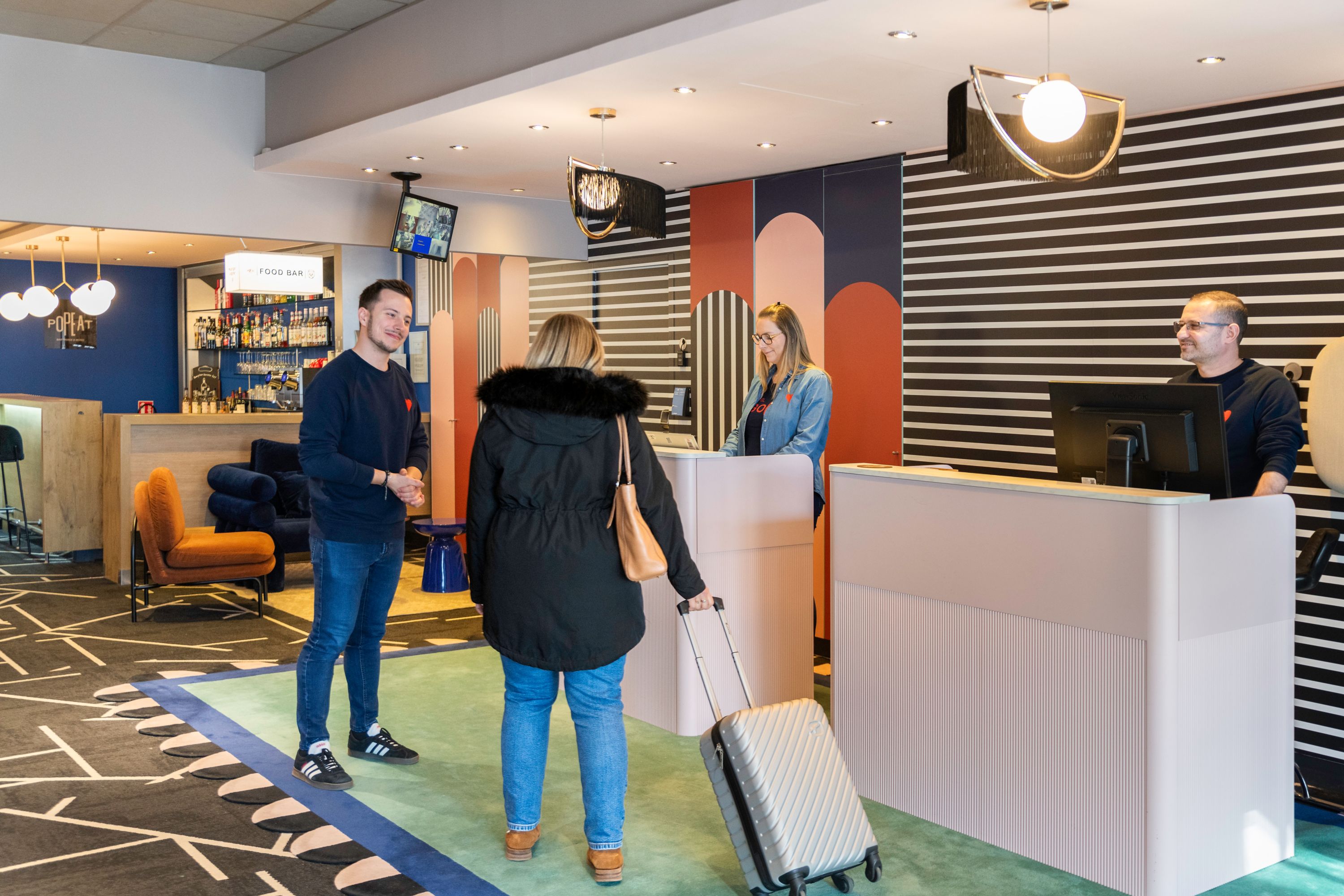 Checking in at a modern hotel reception