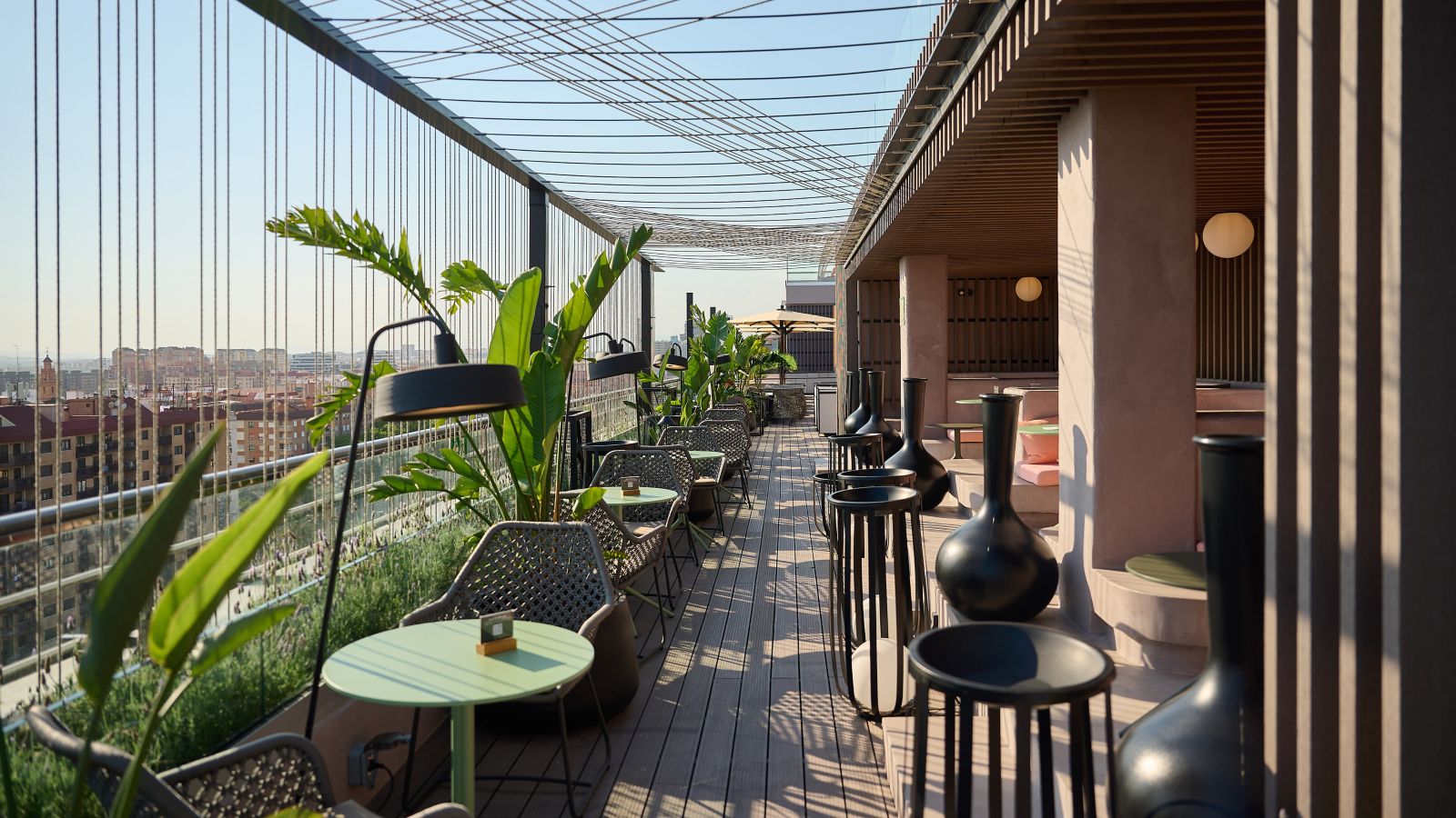 The chic rooftop Sky Bar with impressive city views at Novotel Valencia Lavant