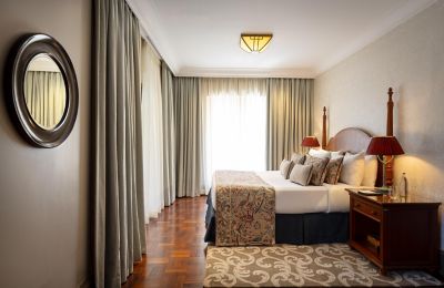fairmont suite with king bed in kenya sunlit interior