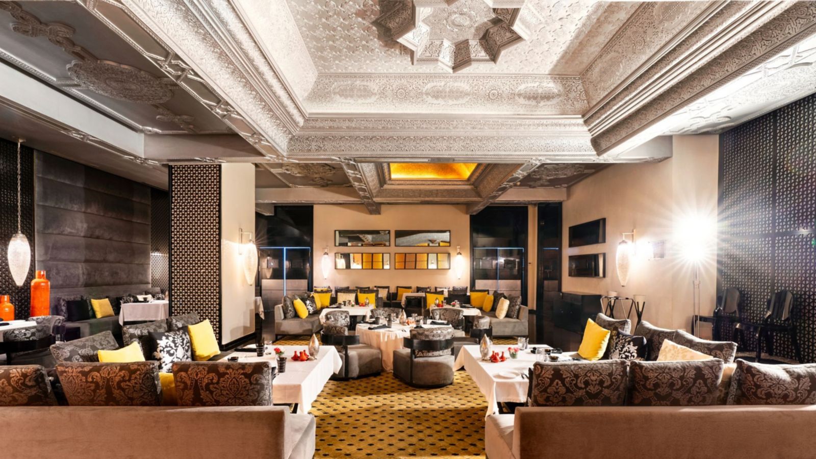 Opulent Moroccan Restaurant with Intricate Ceiling Design