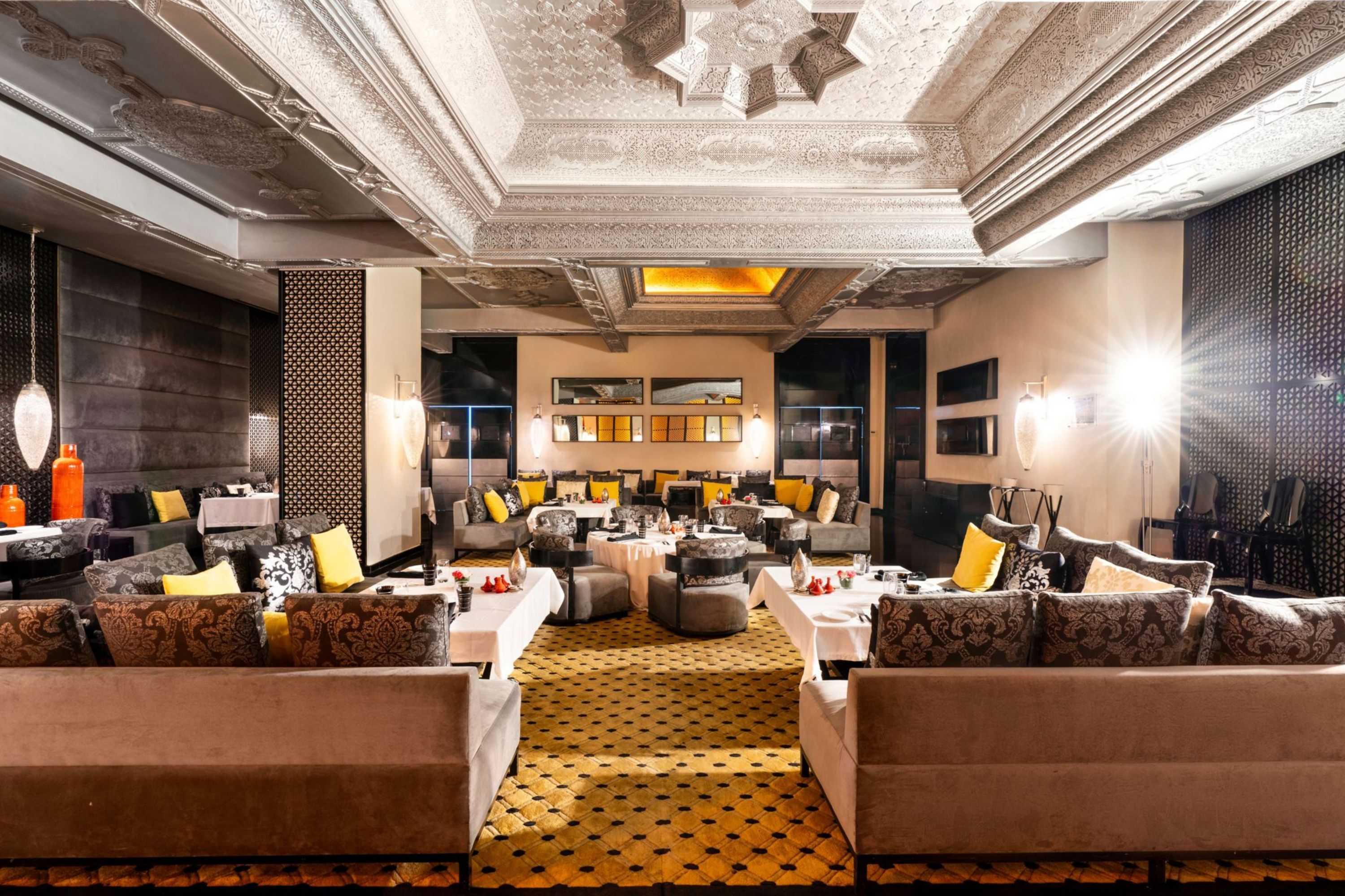 Opulent Moroccan Restaurant with Intricate Ceiling Design