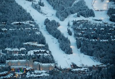 Arieal view of Blackcomb Mountain with Fairmont Chateau Whistler in view. Winter time a dusk