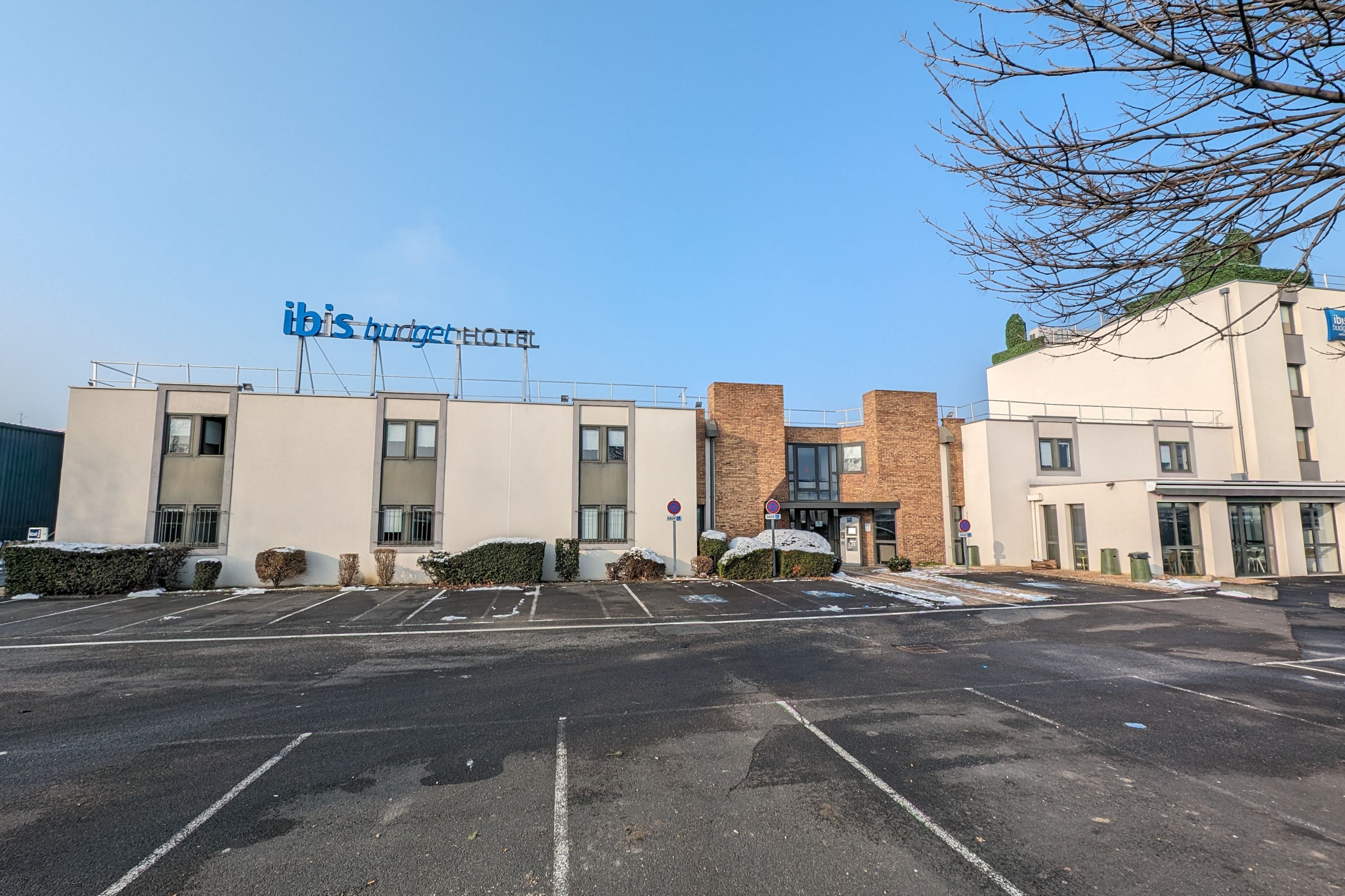 ibis budget Clermont-Ferrand Le Brézet Airport on a clear winter day