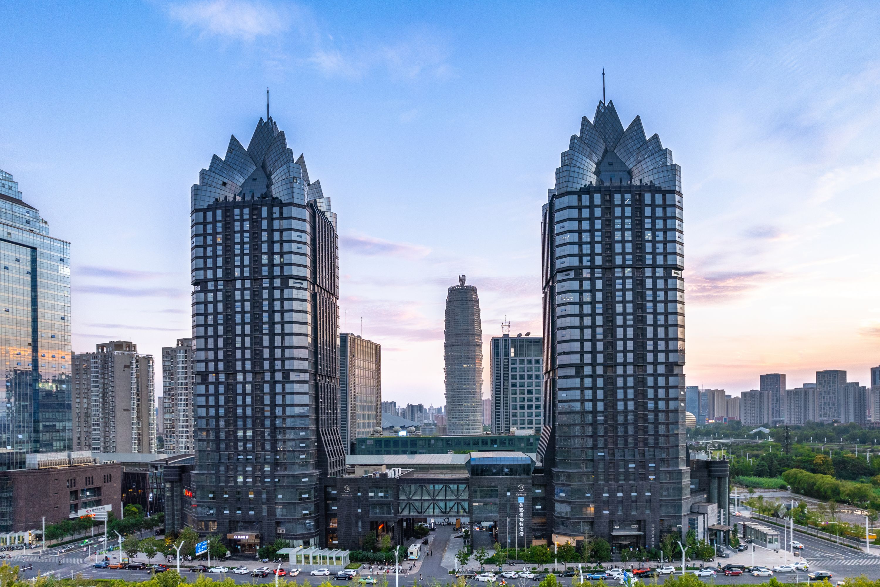 Modern Skyscrapers at Sunset in a Bustling City
