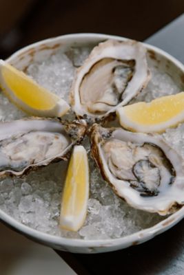 A platter of fresh oysters at Harper Woolf restaurant in Pullman Riga Old Town