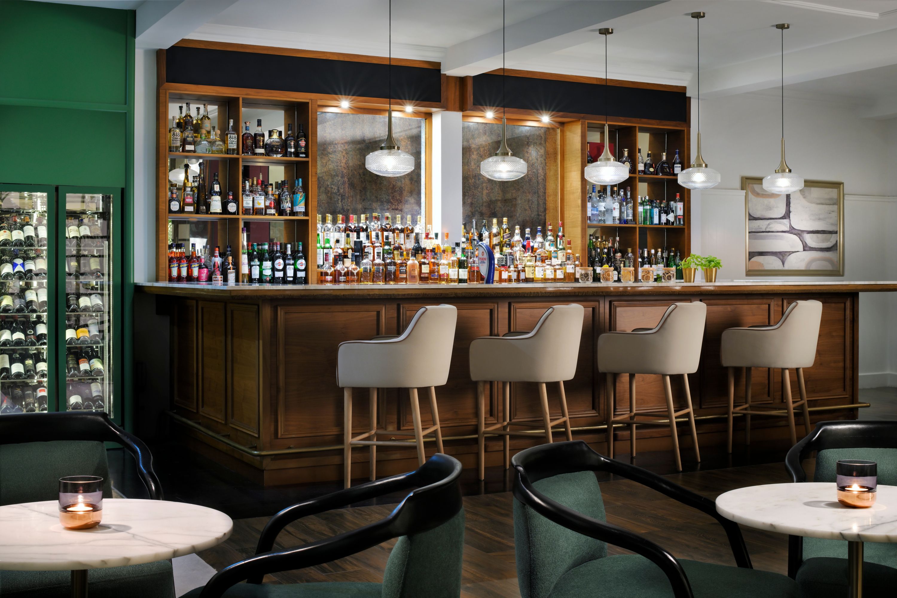 Elegant and inviting: An empty hotel bar bathed in warm light