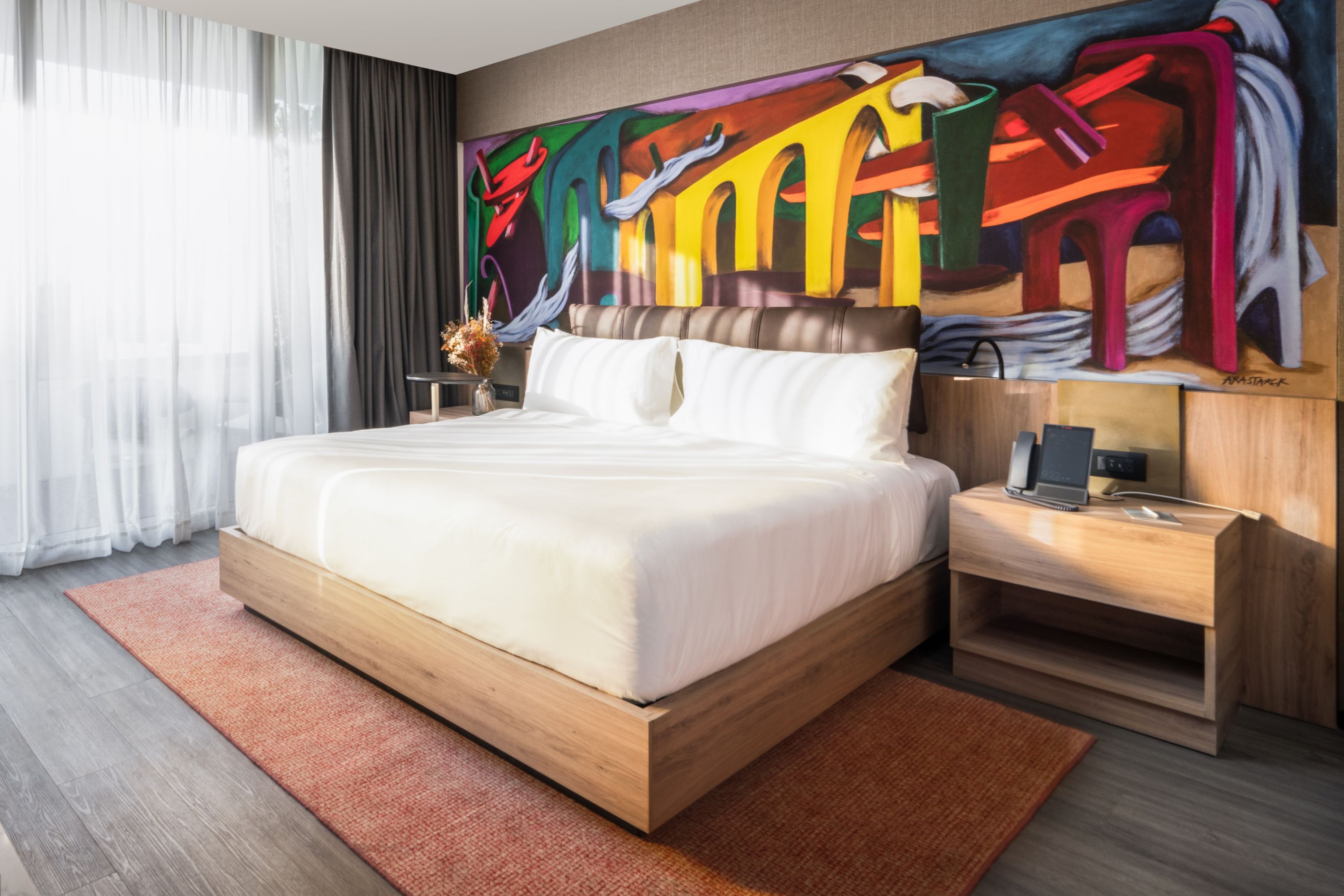 Modern Hotel Room with Vibrant Artwork