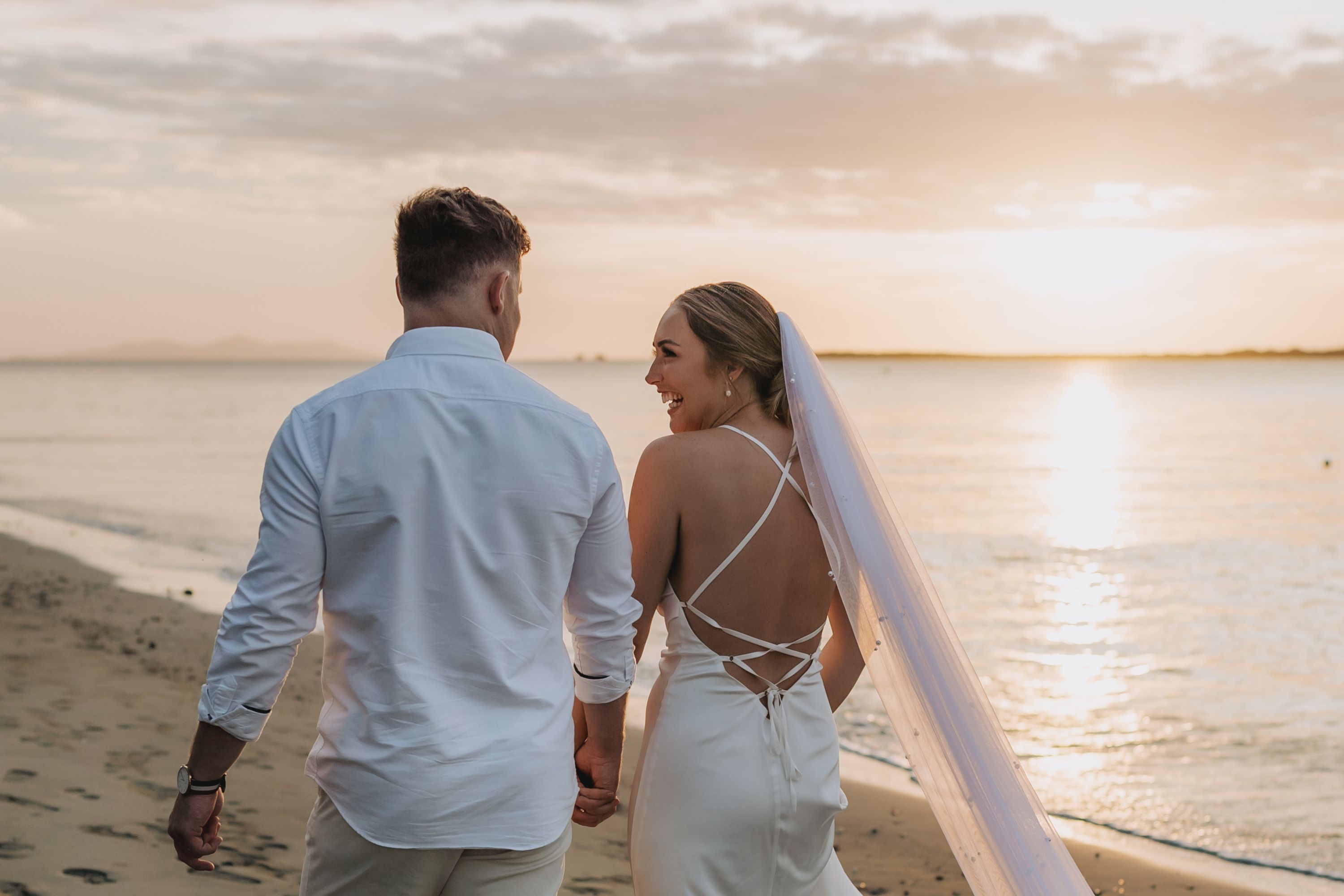 Newlyweds enjoying the sunset at Sofitel Fiji Resort & Spa
