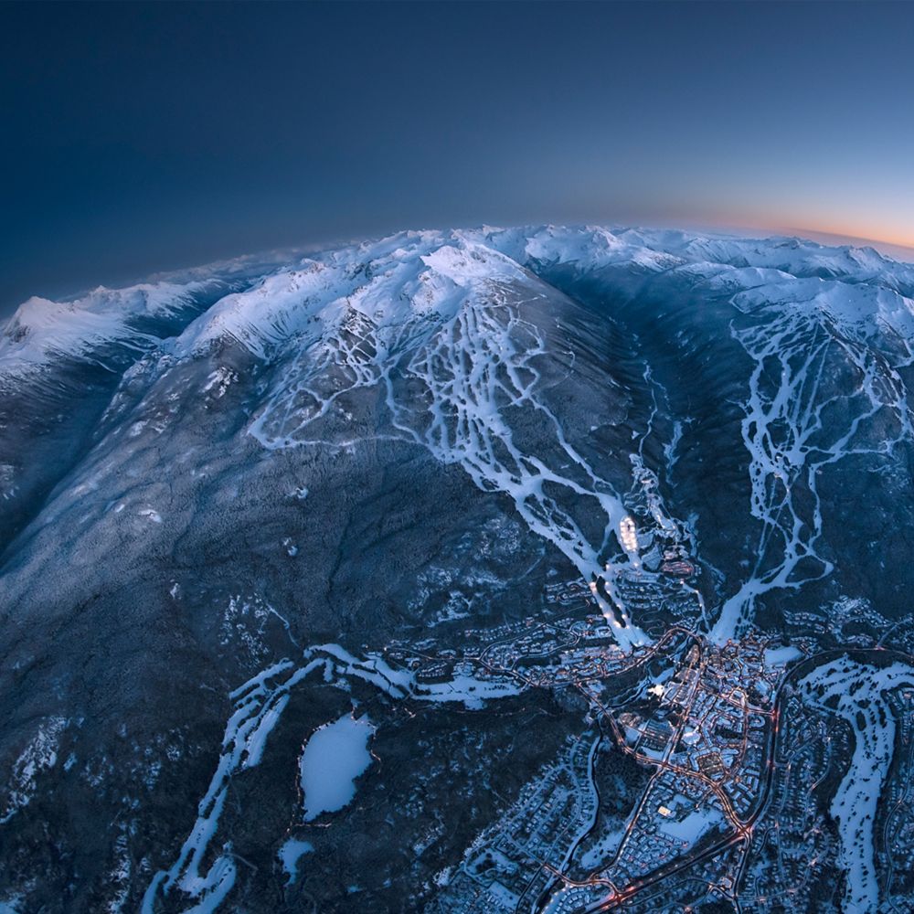 Couple enjoying ski valet chalet at Fairmont Chateau Whistler winter skiing season