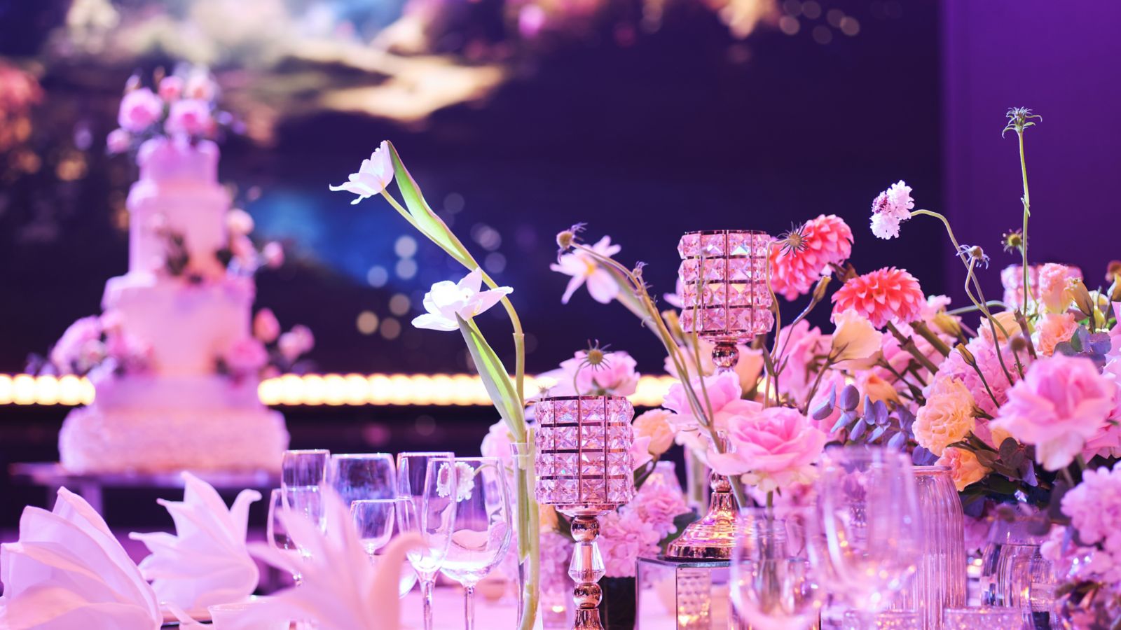 Elegant Wedding Table Setting with Floral Centerpieces