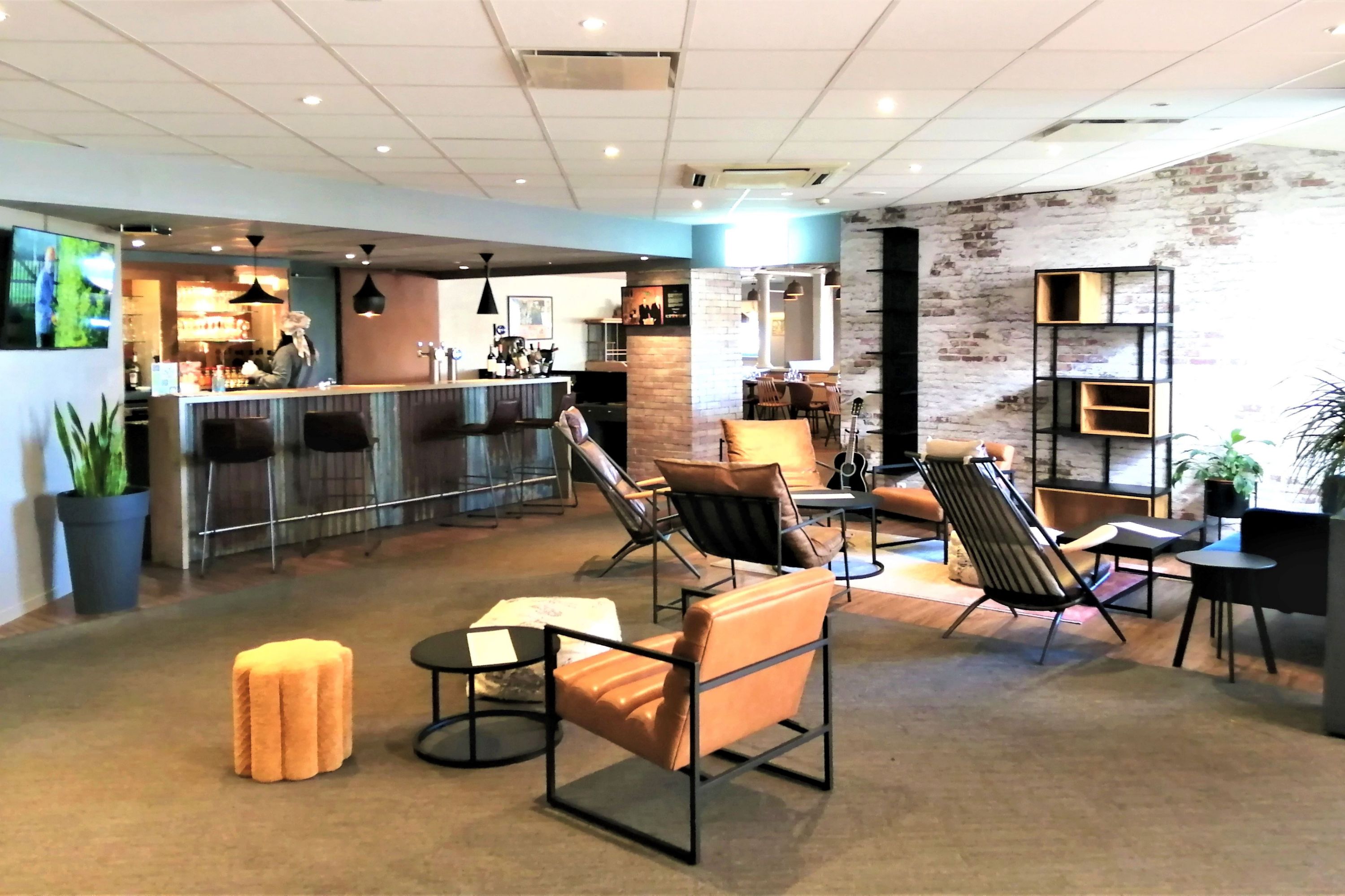 Modern Hotel Lobby with Bar and Lounge Area