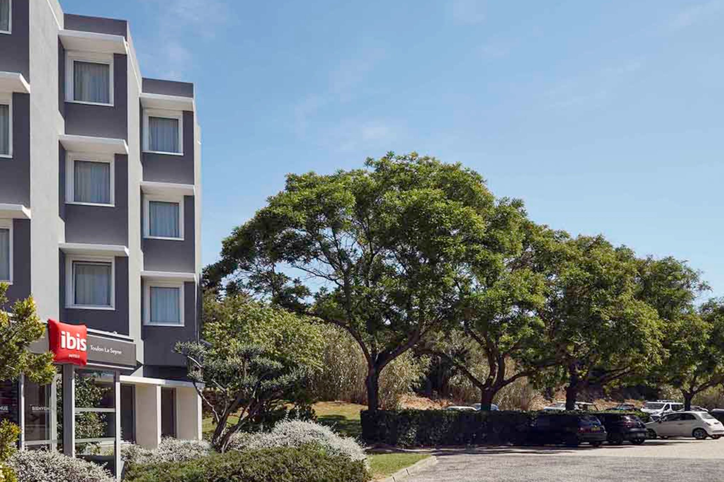 Ibis Sables d'Olonne Hotel Exterior on a Sunny Day