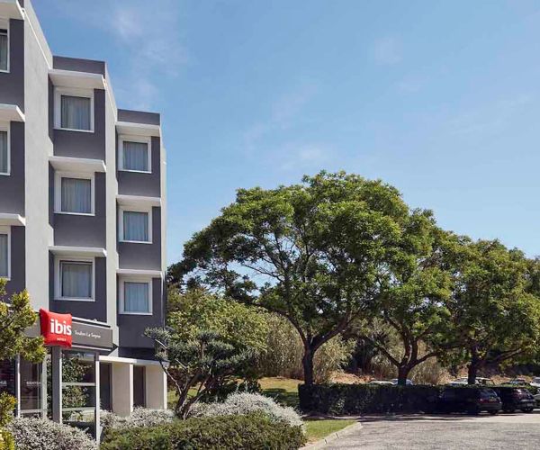 Ibis Sables d'Olonne Hotel Exterior on a Sunny Day