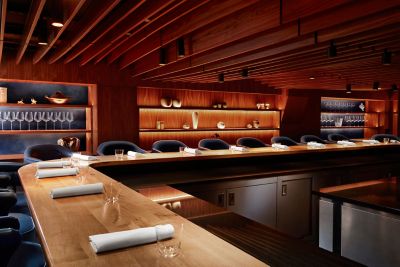 The elegant, curved counter at fine dining restaurant Kitchen Table in London