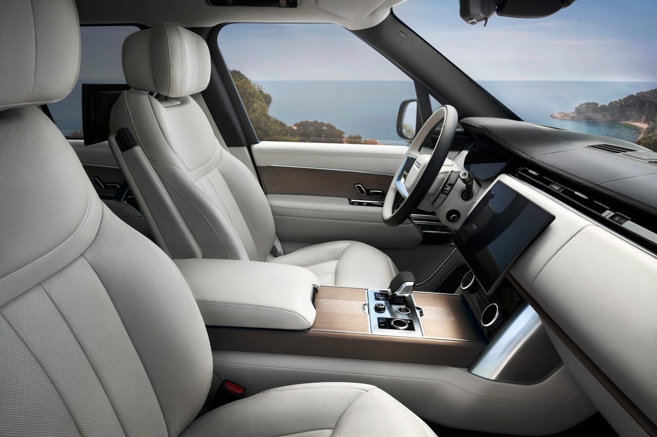 Luxurious Interior of a Range Rover with Ocean View