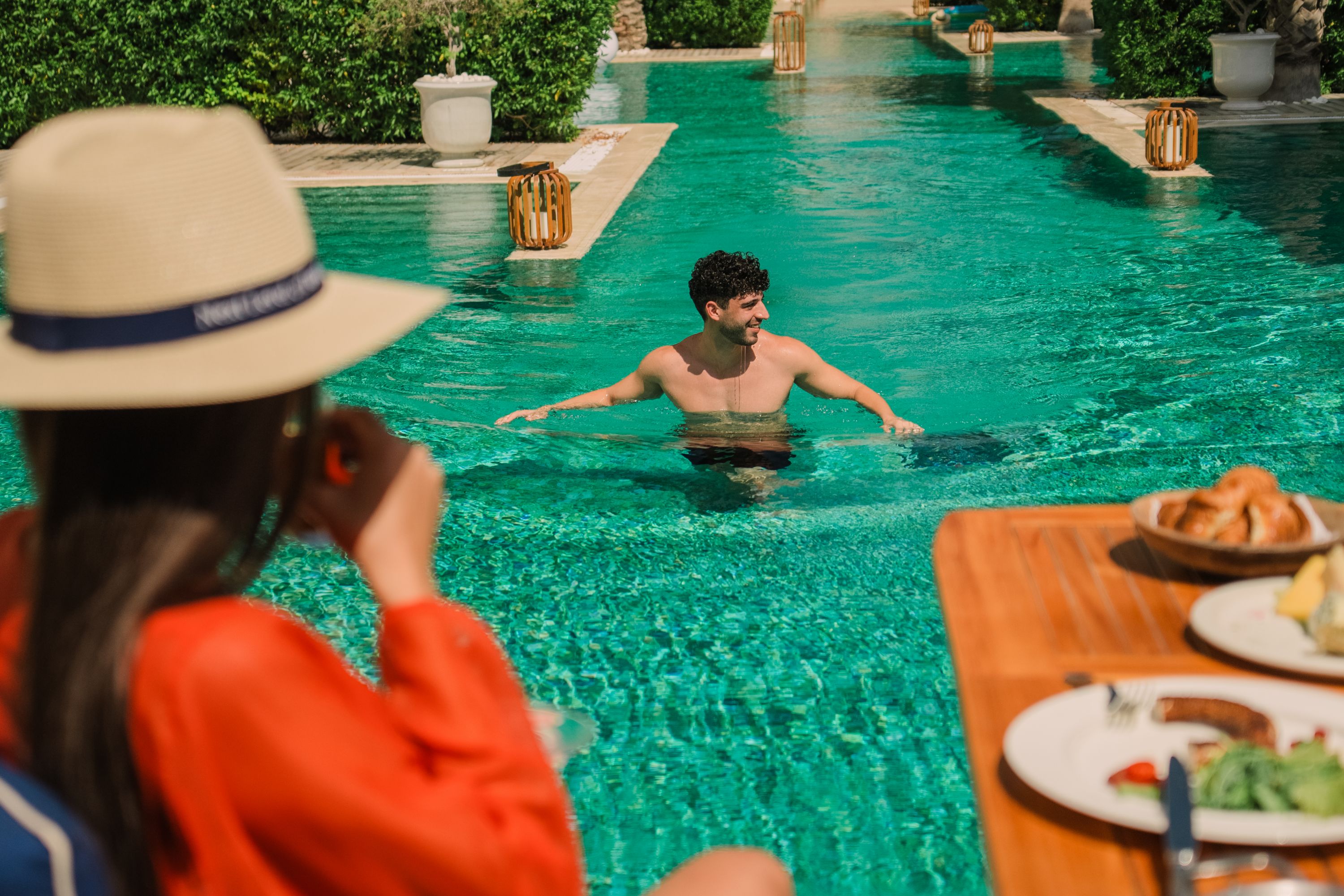 Couple by the pool at Rixos Premium Saadiyat Island, Abu Dhabi