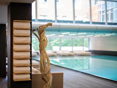 The naturally lit indoor pool at Pullman Berlin Schweizerhof's Fit and Spa Lounge