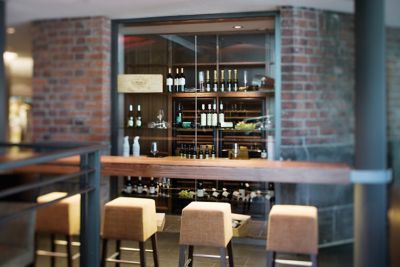 CAVE Bar at Mövenpick Hamburg hotel, decorated in warm wood tones
