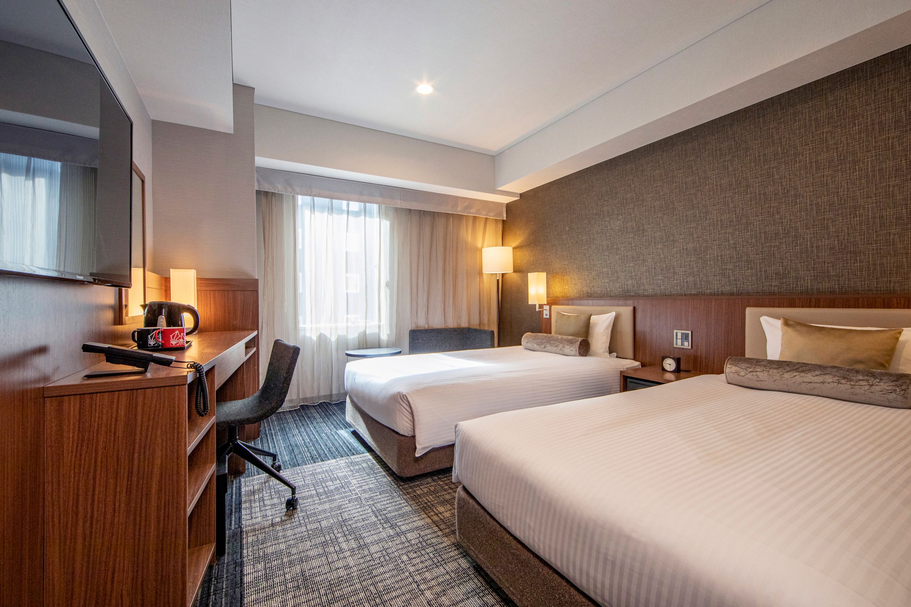 Guest room at the budget friendly hotel ibis Styles Tokyo Ginza