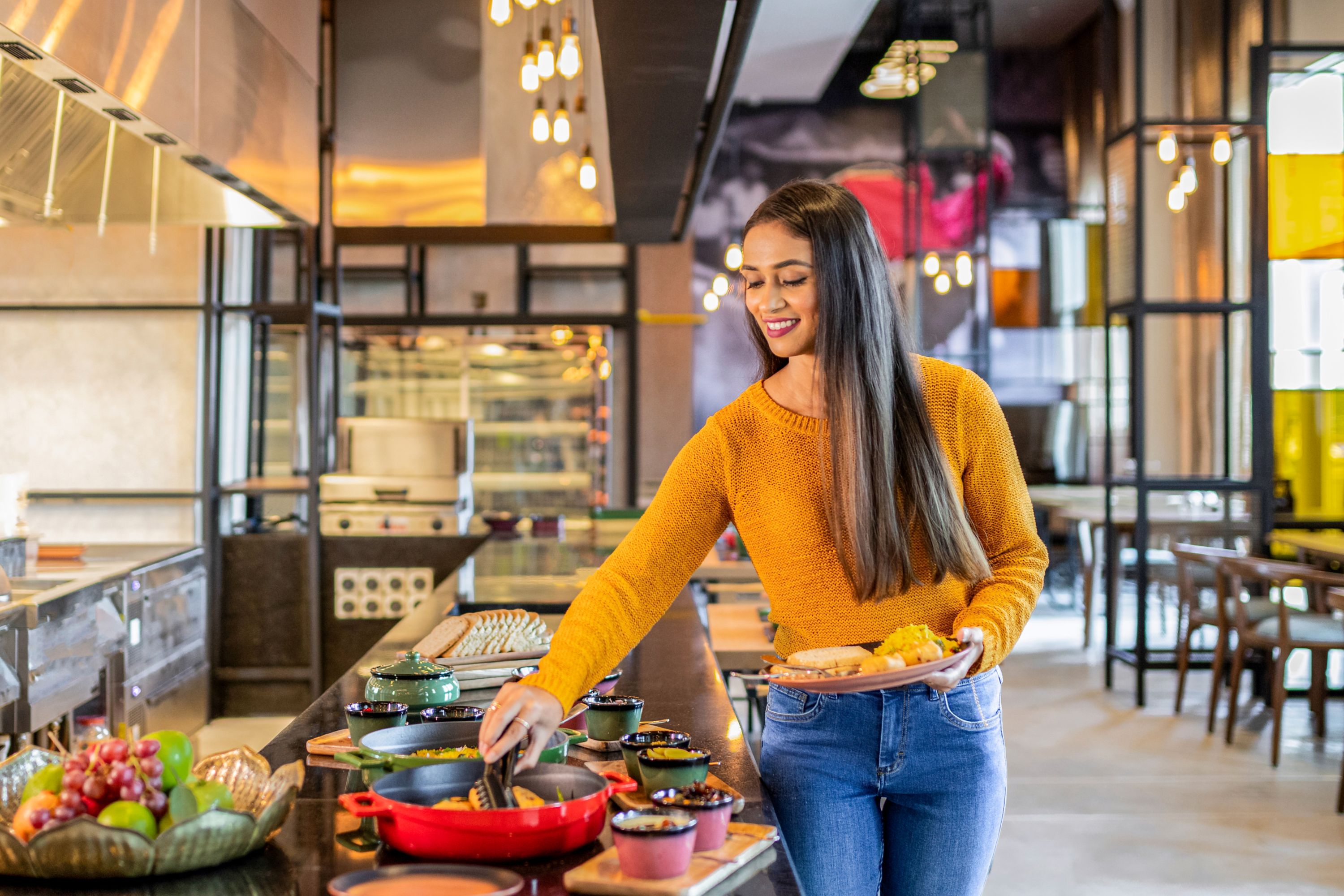 Woman dining at ibis Mumbai Vikhroli