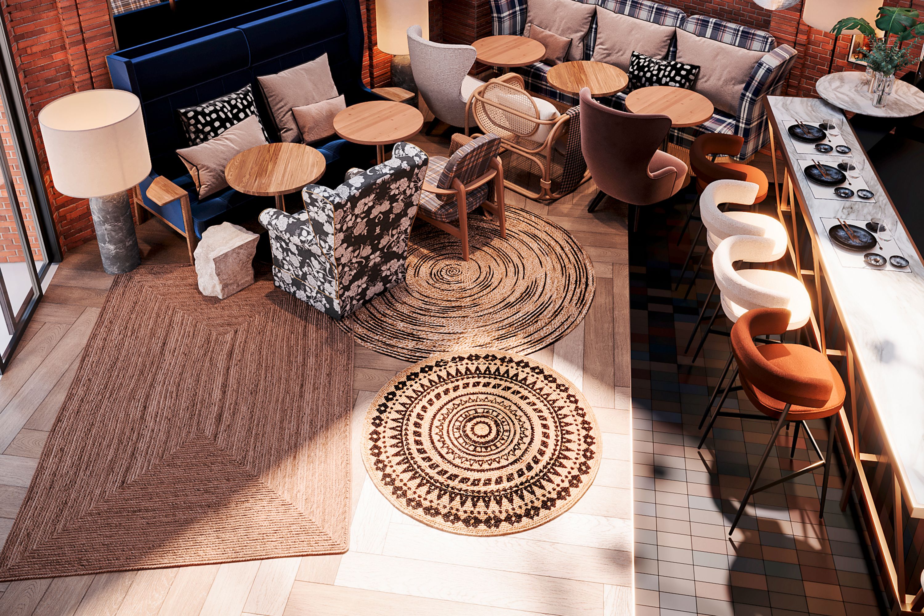 Salon détente et bar Le Wilson à l’hôtel Les Capitouls Toulouse Centre, avec murs en briques rouges et tapis chaleureux