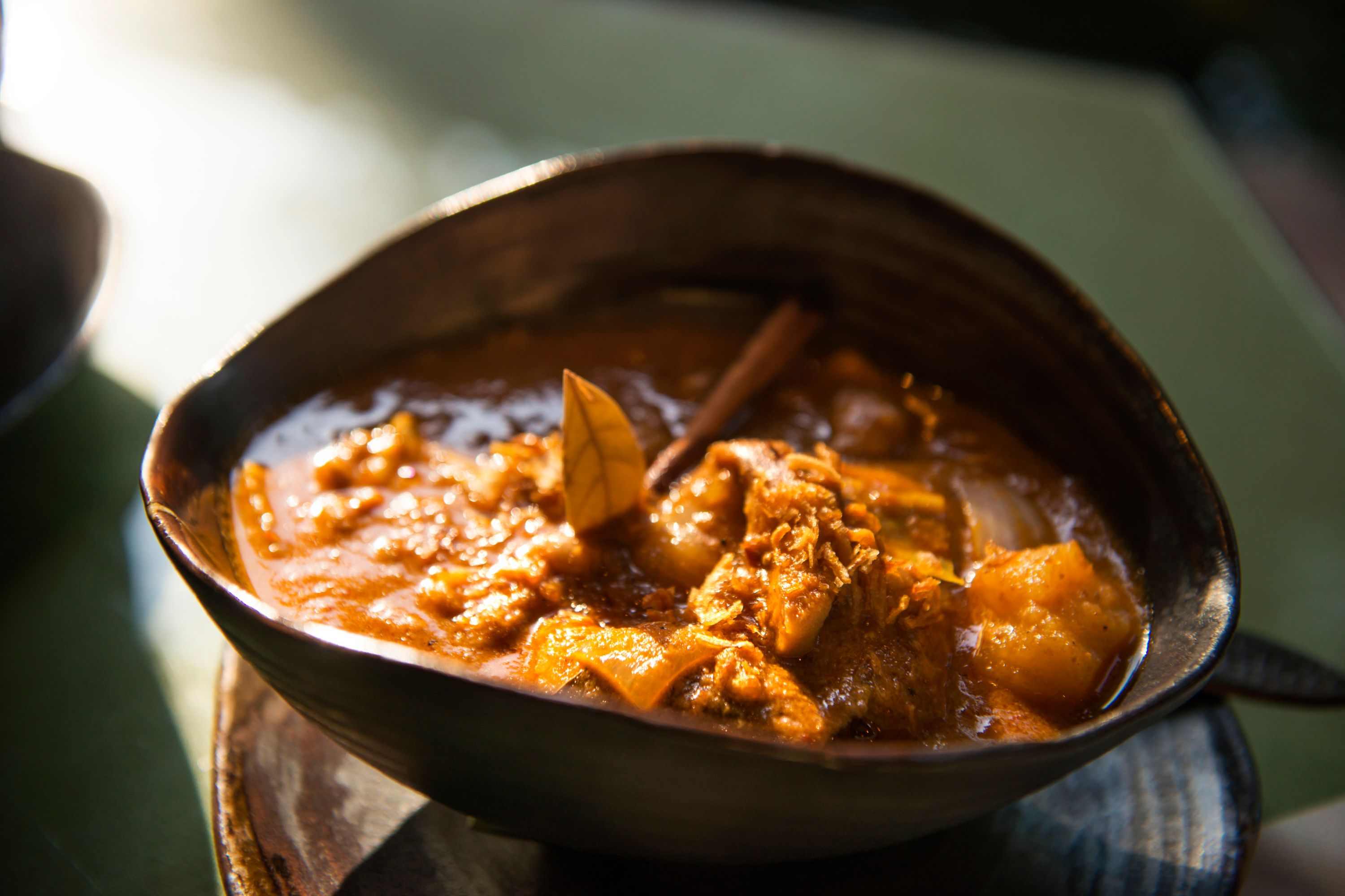 A bowl of traditional Thai food of beef Massaman curry