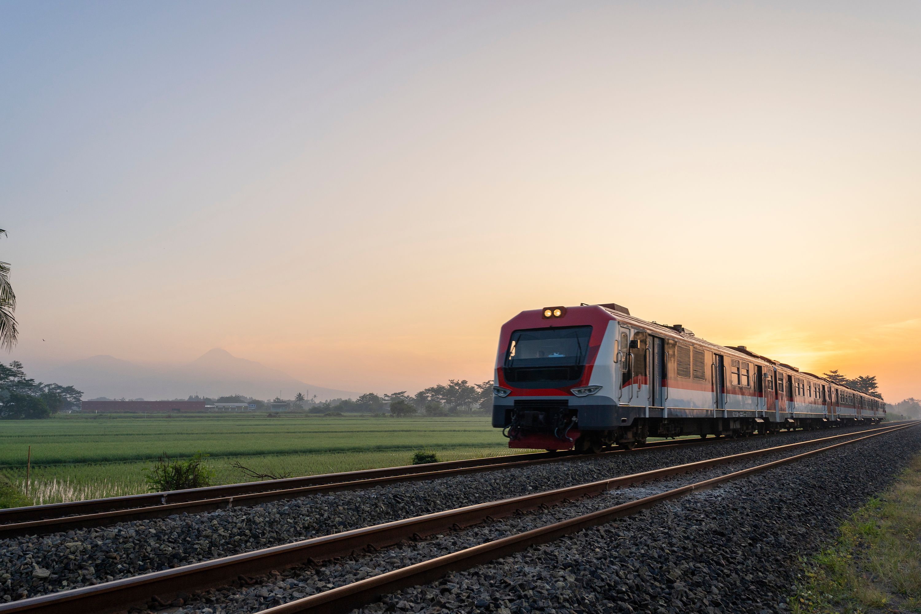 Train passing through countryside in Yogyakarta, Indonesia